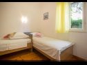 Appartements Damir - 80 m from beach: A1(4), A2(2+2) Postira - Île de Brac  - Appartement - A1(4): chambre &agrave; coucher