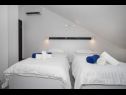 Appartements Jakov - modern and cosy with pool: B2(4), B3(5) Postira - Île de Brac  - Appartement - B3(5): chambre &agrave; coucher