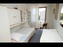 Appartements Fila - large & close to the beach: A1(5) Makarska - Riviera de Makarska  - Appartement - A1(5): chambre &agrave; coucher