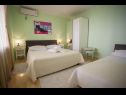 Appartements Palmina - comfort apartment: A1 veliki (6),  A2 žuti (4+1), A3 lila (2), SA4 bijeli (2) Makarska - Riviera de Makarska  - Appartement - A1 veliki (6): chambre &agrave; coucher