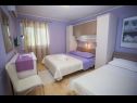 Appartements Palmina - comfort apartment: A1 veliki (6),  A2 žuti (4+1), A3 lila (2), SA4 bijeli (2) Makarska - Riviera de Makarska  - Appartement - A1 veliki (6): chambre &agrave; coucher