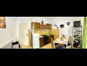 Appartements Bogomir - 80 m from beach: A1(4+1) Podgora - Riviera de Makarska  - Appartement - A1(4+1): cuisine salle à manger