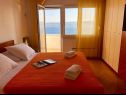Appartements Paradiso with gorgeous sea view: A1 Doris (4+2), SA2 Petra (2+2), SA3 Nina (2) Lokva Rogoznica - Riviera de Omis  - Appartement - A1 Doris (4+2): chambre &agrave; coucher