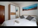 Appartements Lux 1 - heated pool: A1(4), A4(4) Marina - Riviera de Trogir  - Appartement - A1(4): chambre &agrave; coucher