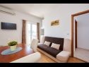 Appartements Mare - 30 m from pebble beach: SA1(2), SA2(2), A3(4), A4(4), A5(8) Seget Vranjica - Riviera de Trogir  - Appartement - A3(4): séjour