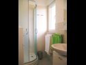 Appartements Tih - 20 m from sea: A1 Ruzmarin(2+2), A2 Maslina(2+2) Sevid - Riviera de Trogir  - Appartement - A1 Ruzmarin(2+2): salle de bain W-C