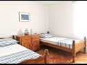 Appartements Garden - sea view: A1(4) Sevid - Riviera de Trogir  - Appartement - A1(4): chambre &agrave; coucher