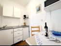 Appartements Kaza - 50m from the beach with parking: A1(2), A2(2), A3(6) Trogir - Riviera de Trogir  - Appartement - A1(2): cuisine salle à manger