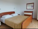 Appartements Ivo - 500 m to sandy beach: A1(2+2), A2(6+2), SA3(2+1) Ljubac - Riviera de Zadar  - Appartement - A1(2+2): chambre &agrave; coucher