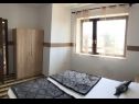 Appartements et chambres Voyasi - 60 m from sea: A1(2), A2(2), A4(2), A6(2), A7(4), R5(2) Starigrad-Paklenica - Riviera de Zadar  - Appartement - A7(4): chambre &agrave; coucher