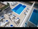 Appartements Ivan - with heated pool and seaview: A1(4), B1(4) Postira - Île de Brac  - piscine