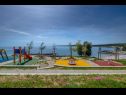 Appartements Rajka - 20 m from beach: Rajka(4) Koromacno - Istrie  - aire de jeux enfants