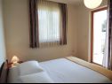 Appartements Smilja - 150 m from pebble beach: A1(2+2), A2(2+1), SA3(2) Baska Voda - Riviera de Makarska  - Appartement - A1(2+2): chambre &agrave; coucher