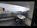 Appartements Villa Esse - heated pool & seaview: A1(2+2), A2(4+2), A3(2+2), A4(4+2), A5(2+2) Baska Voda - Riviera de Makarska  - Appartement - A1(2+2): terrasse couverte