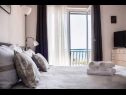 Appartements Ante - seaview A1(5), SA2(3), SA3(2+1) Brela - Riviera de Makarska  - Studio appartement - SA3(2+1): chambre &agrave; coucher
