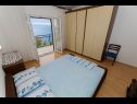 Appartements Miljko - 80 m from beach: A1(6), SA2(2), A10(4+1), A11(2+2) Brela - Riviera de Makarska  - Appartement - A10(4+1): chambre &agrave; coucher