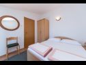 Appartements Gordan - apartments by the sea: A1(3+1), A2(3+1), A3(2) Brist - Riviera de Makarska  - Appartement - A1(3+1): chambre &agrave; coucher
