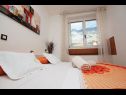 Appartements JoviZ - 20m from the sea A1(3+1) Makarska - Riviera de Makarska  - Appartement - A1(3+1): chambre &agrave; coucher