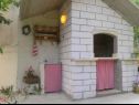 Appartements Viki - seaview & garden terrace: A1(6) Makarska - Riviera de Makarska  - komin