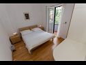 Appartements Cobra - excellent location: A1(2+2), SA2(2+1), A4(4+2) Tucepi - Riviera de Makarska  - Appartement - A1(2+2): chambre &agrave; coucher
