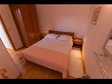 Appartements Cobra - excellent location: A1(2+2), SA2(2+1), A4(4+2) Tucepi - Riviera de Makarska  - Appartement - A4(4+2): chambre &agrave; coucher