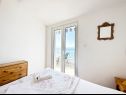 Appartements Tomo - 10 m from beach: A1(2+2), SA2(2) Zaostrog - Riviera de Makarska  - Appartement - A1(2+2): chambre &agrave; coucher