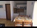 Appartements et chambres Ognjen- family apartments with free parking A1(2+2), SA3(2), R1(2), A5 (4+2) Betina - Île de Murter  - Appartement - A1(2+2): cuisine salle à manger