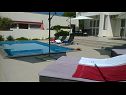 Appartements Markle - swimming pool and sunbeds A1(2+2), A2(4+1), A3(2+2), A4(4+1), A5(2+2), A6(4+1) Banjol - Île de Rab  - piscine (maison et environs)