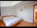 Appartements Lidija - family friendly & close to the sea: A1(4), B2(2+2), C3(2) Banjol - Île de Rab  - Appartement - A1(4): chambre &agrave; coucher