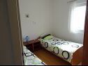 Appartements Zita - 50 m from sea: A1(4) Rogoznica - Riviera de Sibenik  - Appartement - A1(4): chambre &agrave; coucher