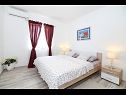 Appartements Anamarija - garden terrace : A1(4) Split - Riviera de Split  - Appartement - A1(4): chambre &agrave; coucher