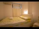 Appartements Brane - great location & garden terrace: A1(6+1) Split - Riviera de Split  - Appartement - A1(6+1): chambre &agrave; coucher