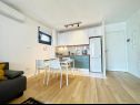 Appartements Mendula - private garage: A1(2+2), A2(2+2) Split - Riviera de Split  - Appartement - A1(2+2): cuisine salle à manger