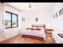 Appartements Tomi - with large terrace (60m2): A1(4) Trogir - Riviera de Trogir  - Appartement - A1(4): chambre &agrave; coucher