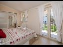 Appartements Dora - free parking: A1(4), SA2(3), A3(2+2) Trogir - Riviera de Trogir  - Appartement - A1(4): chambre &agrave; coucher