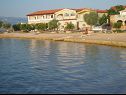 Appartements Vanja - terrace & BBQ A1(4+2), A2(4+1) Vir - Riviera de Zadar  - plage